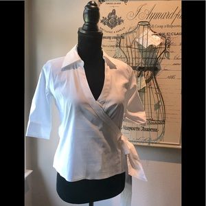 White Cross Blouse. 3/4 Sleeves. NWT. Size XXS. White House Black Market